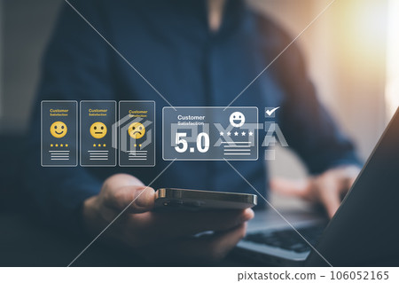 Hand holding Smartphone with Customer review satisfaction feedback survey concept, Users give a rating to service experience on the online application, service leading to reputation ranking 106052165