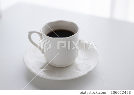 Coffee in white cup Coffee in white cup 106052438