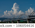 Summer sky, clouds and bridge 106054416