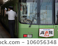 Keio Series 8000 green-wrapped car with Takao head mark Conductor's pointing and calling 106056348