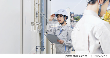 Engineer inspecting equipment Engineer inspecting equipment 106057244