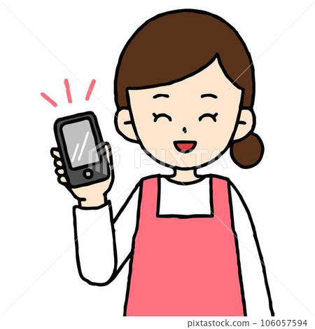A housewife holding a smartphone with a smile A housewife holding a smartphone with a smile 106057594