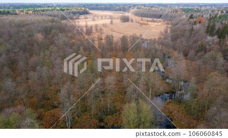 Lesna River valley to east in sunset aerial Lesna River valley to east in sunset aerial 106060845