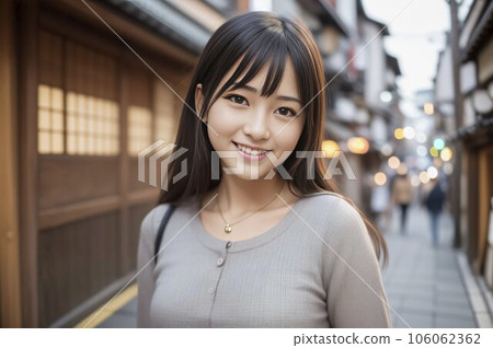 Japanese beauty smiling in a narrow alley Japanese beauty smiling in a narrow alley 106062362