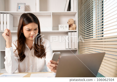 Young woman stressed or worried about doing a wrong job, Despair or disappointment, Sad feeling, Suffering, Desperate, Hopeless, Fail, disastrous, bankrupt, Scared, panicky, Failure of life. 106062504