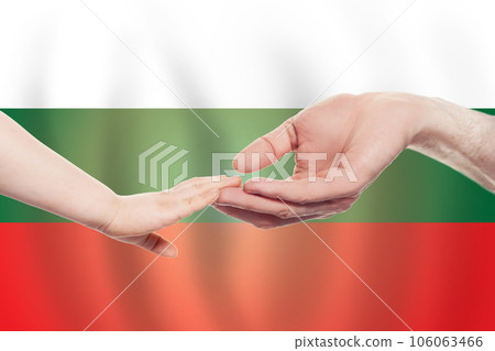 Bulgarian baby and parent hands on the background of flag of Bulgary Help, aid, support 106063466