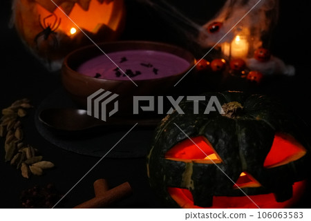 Halloween ominous soup and jack-o'-lanterns 106063583