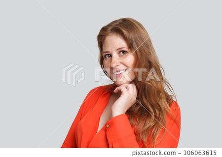Happy attractive woman smiling on white background Happy attractive woman smiling on white background 106063615