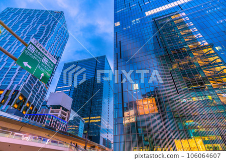 Tokyo cityscape in Japan Metropolitan expressway entrance sign and Sakuragaoka redevelopment. Surrounding buildings are reflected to create a new cityscape 106064607