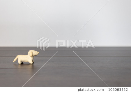 Small dog figurine in unglazed earthenware Small dog figurine in unglazed earthenware 106065532