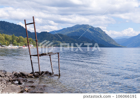 Teletskoye lake, coastal landscape with huge chair 106066191