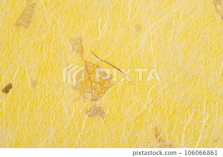 The Yellow color mulberry paper texture background in close-up. 106066861