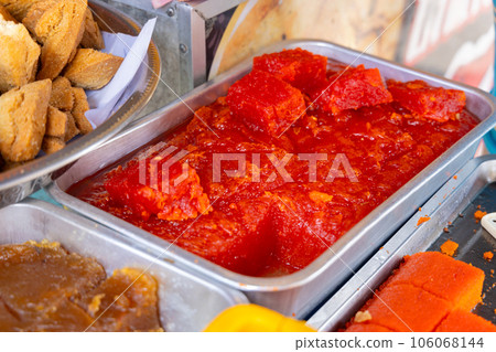Delicious jelly snacks at a street food stall in Asia Delicious jelly snacks at a street food stall in Asia 106068144