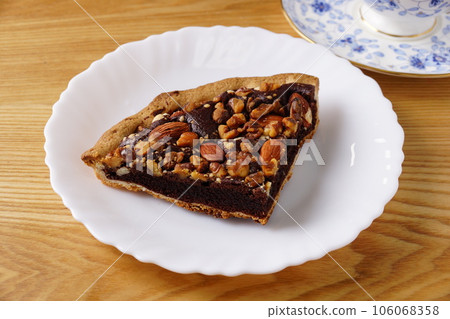Nut chocolate tart cake 106068358