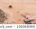 Planet Mars like landscape - Photo of Wadi Rum desert in Jordan with red pink sky above, this location was used as set for many science fiction movies 106068966