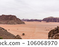 Planet Mars like landscape - Photo of Wadi Rum desert in Jordan with red pink sky above, this location was used as set for many science fiction movies 106068970