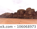 Planet Mars like landscape - Photo of Wadi Rum desert in Jordan with red pink sky above, this location was used as set for many science fiction movies 106068973