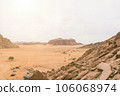 Planet Mars like landscape - Photo of Wadi Rum desert in Jordan with red pink sky above, this location was used as set for many science fiction movies 106068974