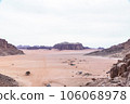 Planet Mars like landscape - Photo of Wadi Rum desert in Jordan with red pink sky above, this location was used as set for many science fiction movies 106068978