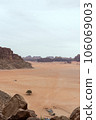 Planet Mars like landscape - Photo of Wadi Rum desert in Jordan with red pink sky above, this location was used as set for many science fiction movies 106069003