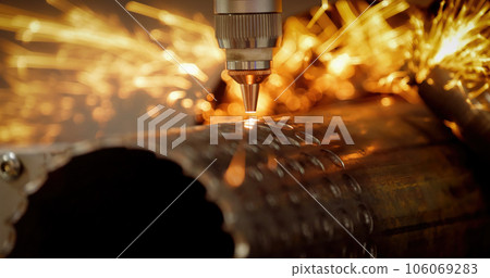 CNC Laser cutting of metal, modern industrial technology. 106069283