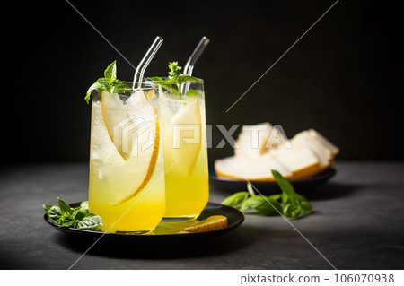 Melon juice, lemonade in glasses 106070938