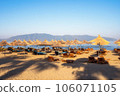 Beach umbrellas from the sun and sun loungers on the beach. 106071105