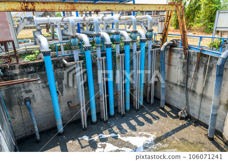 Water pipes connected to large water pumps are used to pump wastewater into the wastewater treatment 106071241