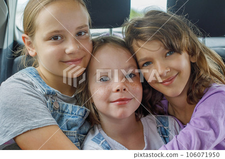 Portrait of little girl friends hugging together. Happy kids Portrait of little girl friends hugging together. Happy kids 106071950