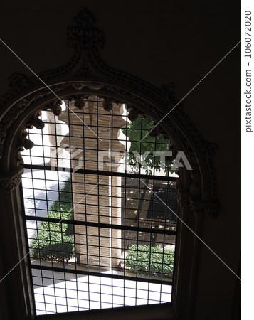 Arabic lattice window at palace in Saragossa city in Spain - vertical 106072020