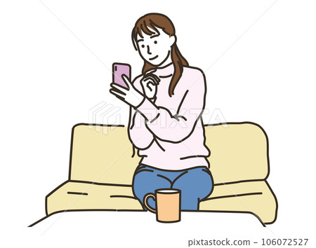 A young woman in plain clothes looking at a smartphone with a smile 106072527
