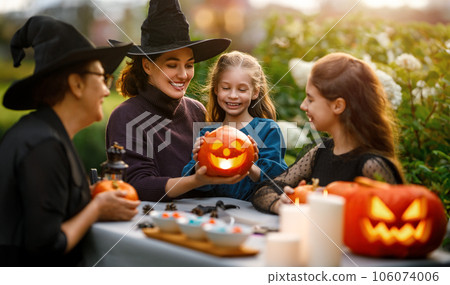 family preparing for Halloween family preparing for Halloween 106074006