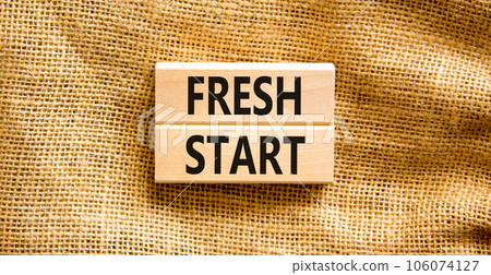Fresh start and motivational symbol. Concept words Fresh start on beautiful wooden block. Beautiful canvas table canvas background. Business motivational and Fresh start concept. Copy space. Fresh start and motivational symbol. Concept words Fresh start on beautiful wooden block. Beautiful canvas table canvas background. Business motivational and Fresh start concept. Copy space. 106074127