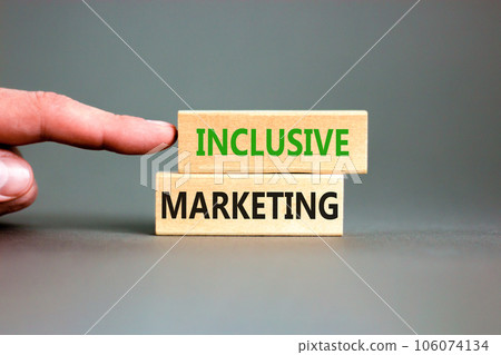 Inclusive marketing symbol. Concept words Inclusive marketing on beautiful wooden block. Beautiful grey table grey background. Businessman hand. Business inclusive marketing concept. Copy space. Inclusive marketing symbol. Concept words Inclusive marketing on beautiful wooden block. Beautiful grey table grey background. Businessman hand. Business inclusive marketing concept. Copy space. 106074134