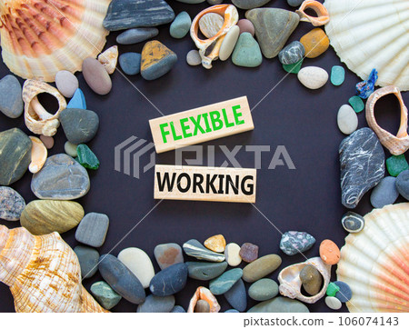 Flexible working symbol. Concept words Flexible working on beautiful wooden blocks. Sea shell stone. Beautiful black table black background. Business flexible working concept. Copy space. 106074143