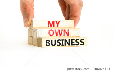 My own business symbol. Concept words My own business on wooden block. Beautiful white table white background. Businessman hand. Business motivational my own business concept. Copy space. My own business symbol. Concept words My own business on wooden block. Beautiful white table white background. Businessman hand. Business motivational my own business concept. Copy space. 106074181