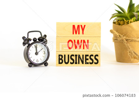 My own business symbol. Concept words My own business on wooden block. Beautiful white table white background. Black alarm clock. Business motivational my own business concept. Copy space. My own business symbol. Concept words My own business on wooden block. Beautiful white table white background. Black alarm clock. Business motivational my own business concept. Copy space. 106074183