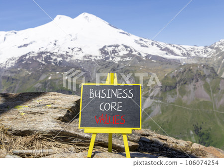 Business core values symbol. Concept words Business core values on beautiful chalk blackboard. Beautiful mountain Elbrus background. Business motivational business core values concept. Copy space. Business core values symbol. Concept words Business core values on beautiful chalk blackboard. Beautiful mountain Elbrus background. Business motivational business core values concept. Copy space. 106074254