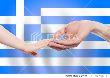 Greek baby and parent hands on the background of flag of Greece Help, aid, support, charity concept Greek baby and parent hands on the background of flag of Greece Help, aid, support, charity concept 106074604