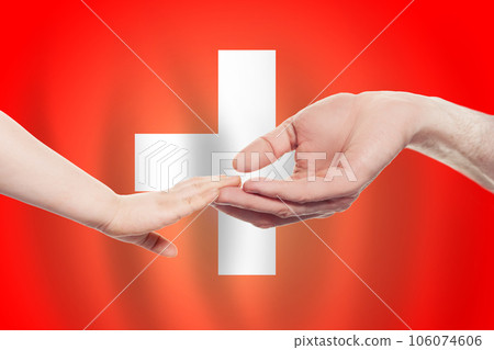 Swiss baby and parent hands on the background of flag of Switzerland Help, aid, support, concept Swiss baby and parent hands on the background of flag of Switzerland Help, aid, support, concept 106074606