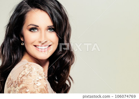 Young happy brunette model woman with long hair and cute smile on white banner background Young happy brunette model woman with long hair and cute smile on white banner background 106074769
