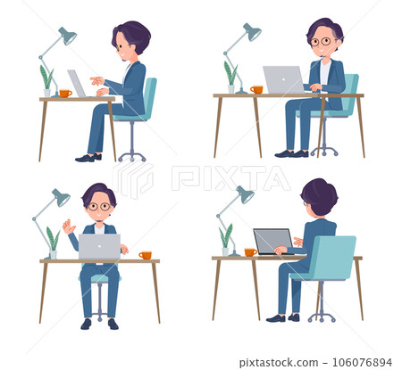 A set of business men doing desk work on a PC 106076894