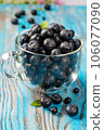 Fresh blueberries in a glass cup 106077090