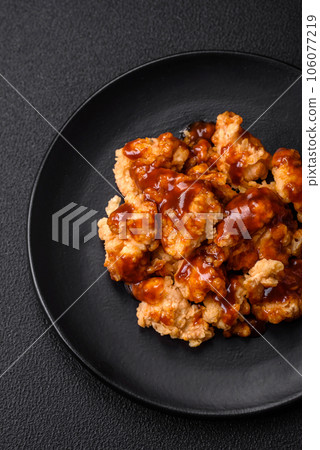Delicious juicy grilled chicken meat bites with salt, spices and herbs Delicious juicy grilled chicken meat bites with salt, spices and herbs 106077219