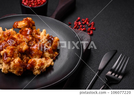Delicious juicy grilled chicken meat bites with salt, spices and herbs 106077220