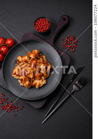 Delicious juicy grilled chicken meat bites with salt, spices and herbs Delicious juicy grilled chicken meat bites with salt, spices and herbs 106077224