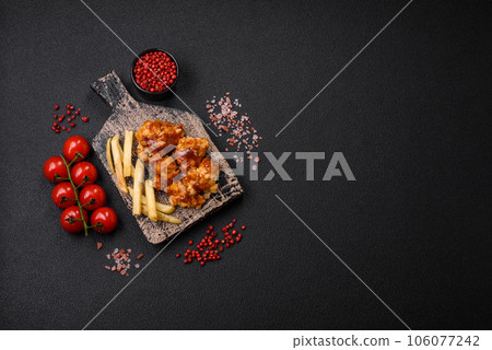 Delicious juicy grilled chicken meat bites with salt, spices and herbs 106077242