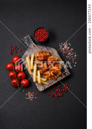 Delicious juicy grilled chicken meat bites with salt, spices and herbs 106077243