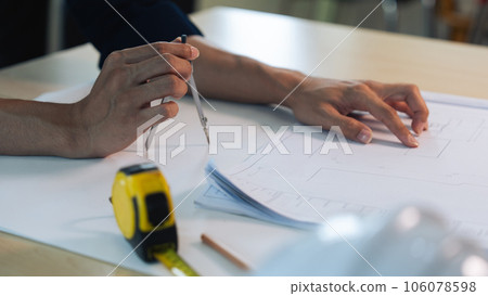 Group of engineer is discussion and brainstorming about condominium model of construction project Group of engineer is discussion and brainstorming about condominium model of construction project 106078598