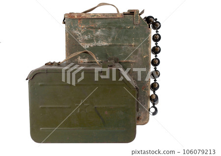 Ammo box with ammunition belt and 14.5mm cartridges for a 14.5mm KPVT heavy machine gun used by the former Soviet Union isolated on white background. 106079213